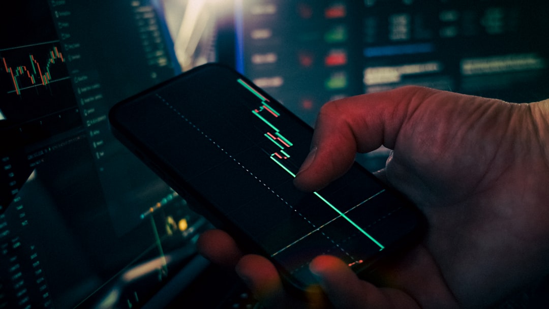 retail investor trading stocks on a smartphone app