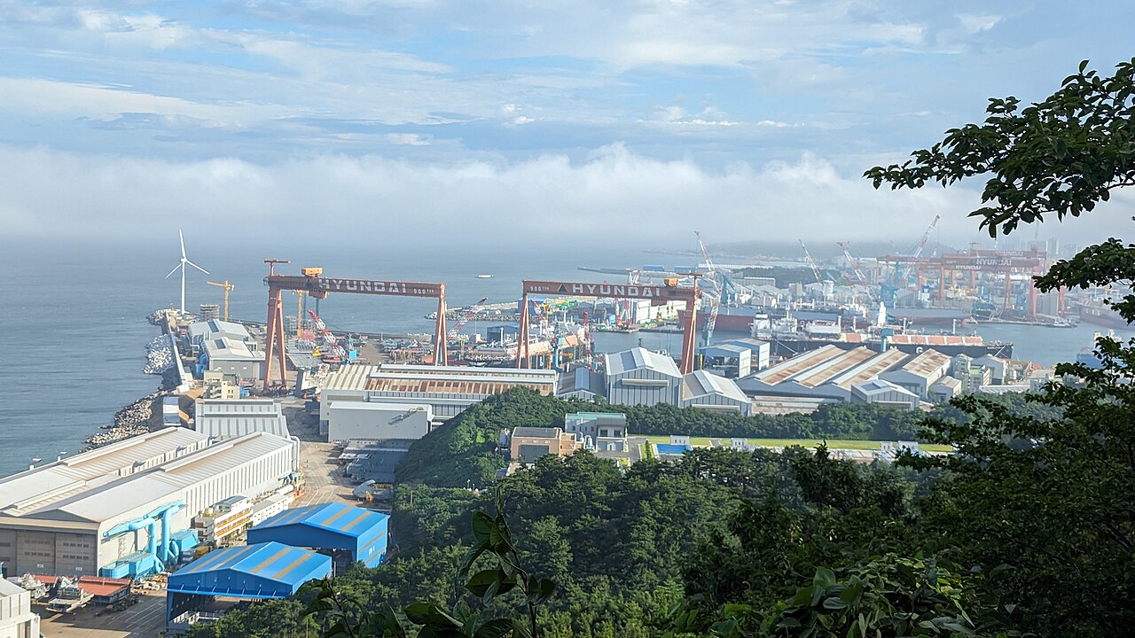 HD Hyundai Heavy Industries stock context, Ulsan shipyard construction docks