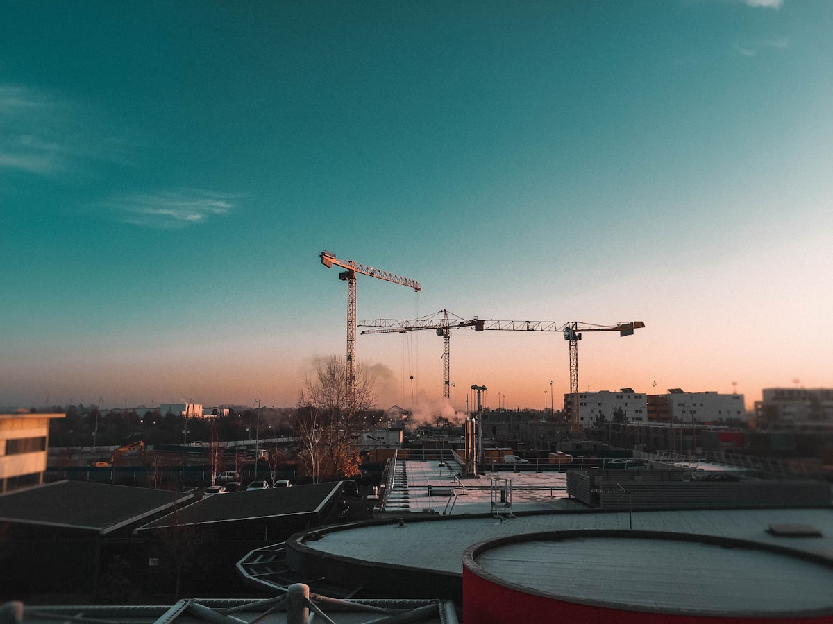Tower cranes at an apartment construction site