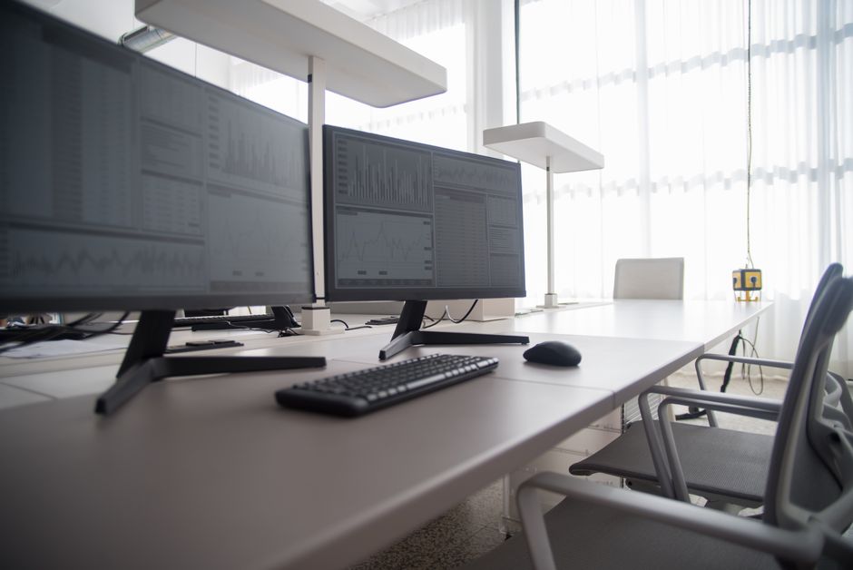 AhnLab stock research desk with analysis screens