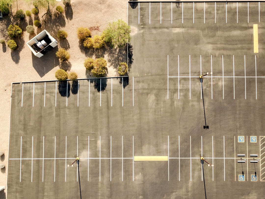 Aerial view of a large retail parking lot, used to illustrate an Emart stock analysis