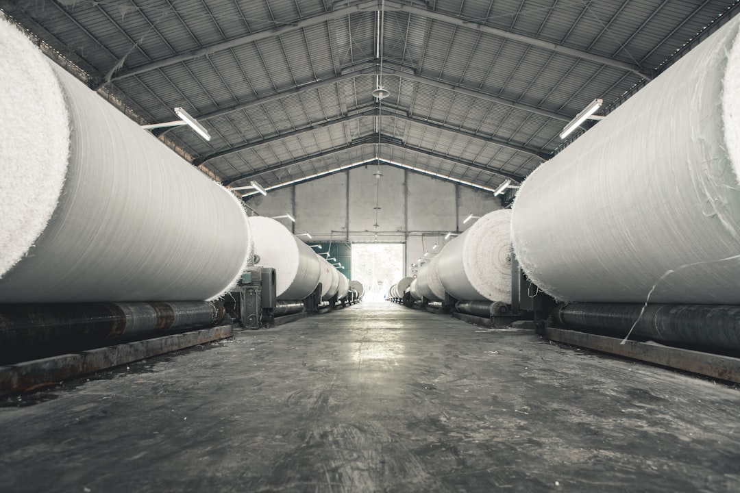 Hansol Paper stock coverage image showing a paper reel line in a mill