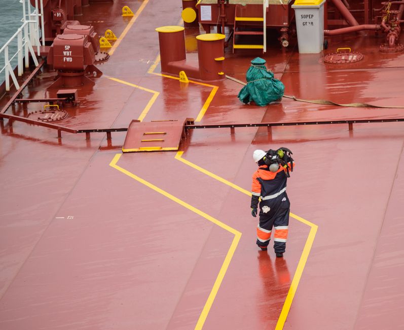 Crew working on the deck of a vessel in service, the setting of marine aftermarket work
