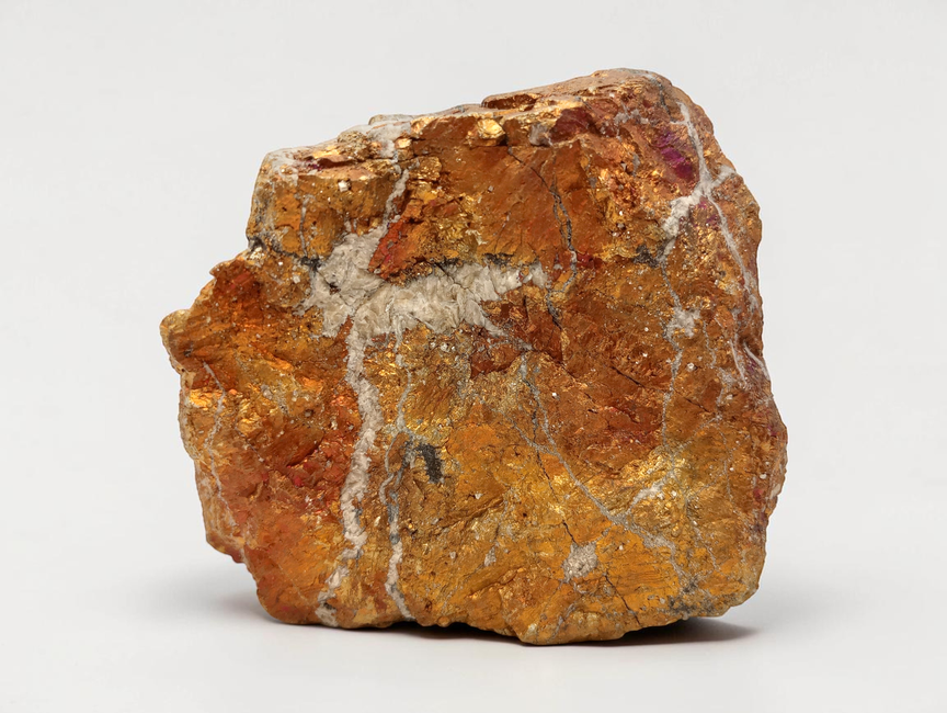 A mineral ore specimen photographed against a plain background