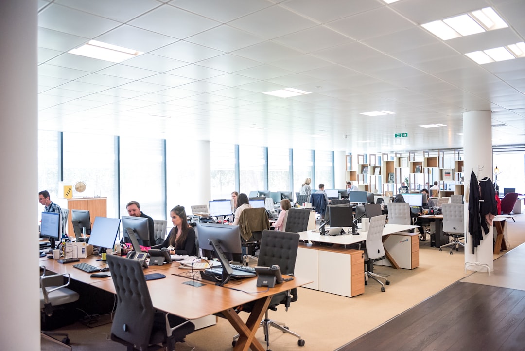 Open-plan office interior used to illustrate an equity journal entry on Pearl Abyss stock and its 2026 revenue guidance