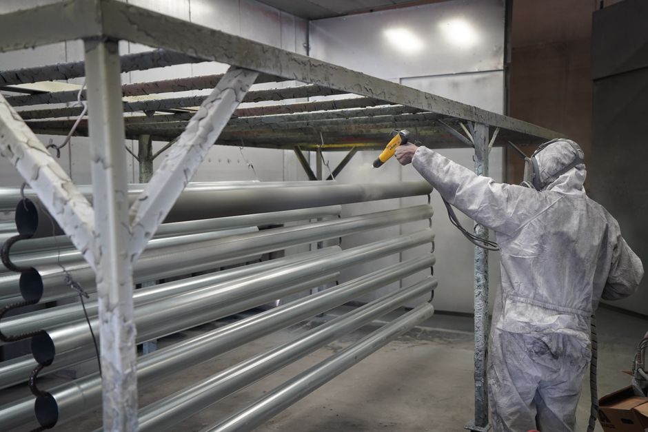Industrial powder coating work, used as in this POSCO Future M stock note on anode materials
