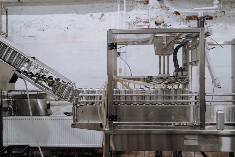 A stainless steel food filling line stands in for the manufacturing base behind Pulmuone stock
