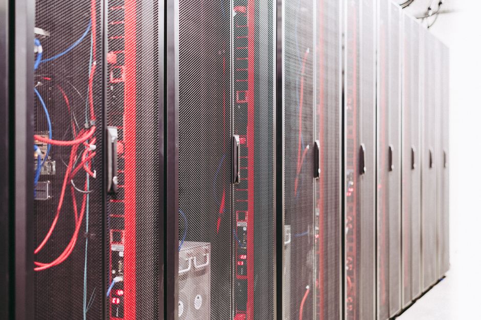 Server racks inside a data center (illustrative stock image)
