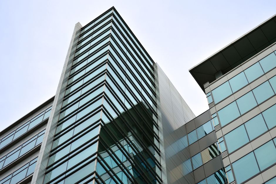 modern glass office building with no visible signage