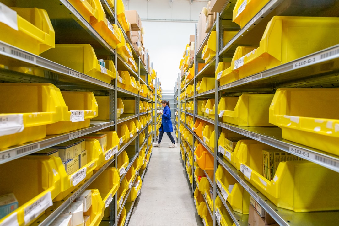 Rows of parts bins in an industrial storage aisle