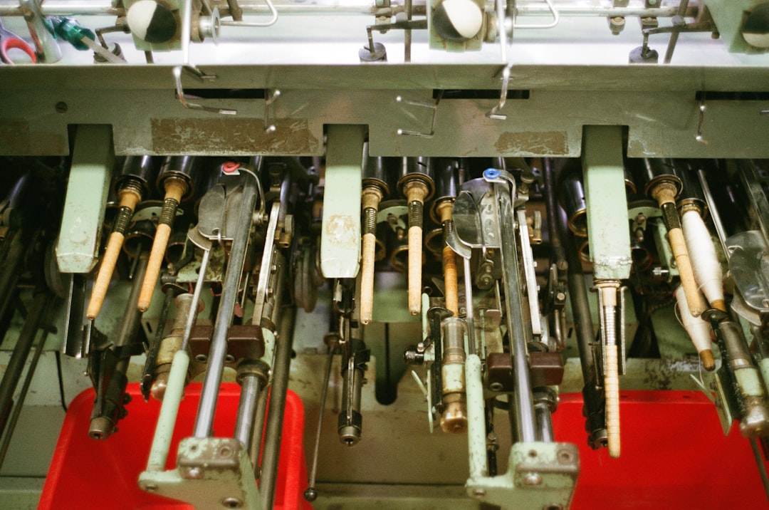 Doosan Robotics stock analysis image of an automated roller conveyor line in a logistics building