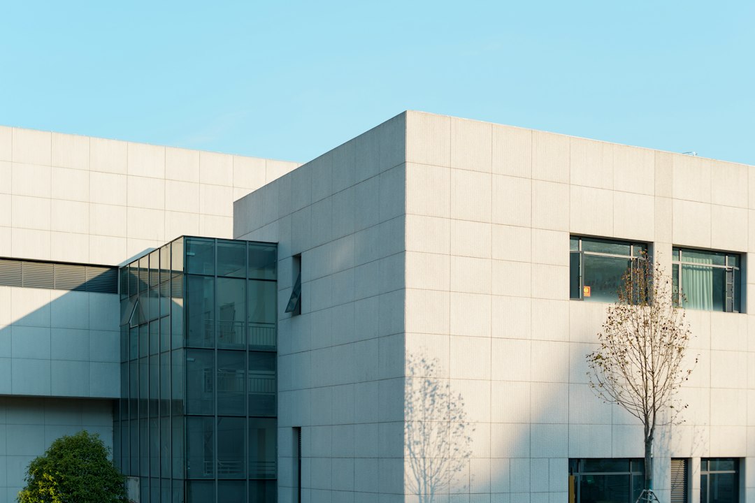 Reference exterior used with this Hyundai Department Store stock record: a plain stone-clad building facade in daylight