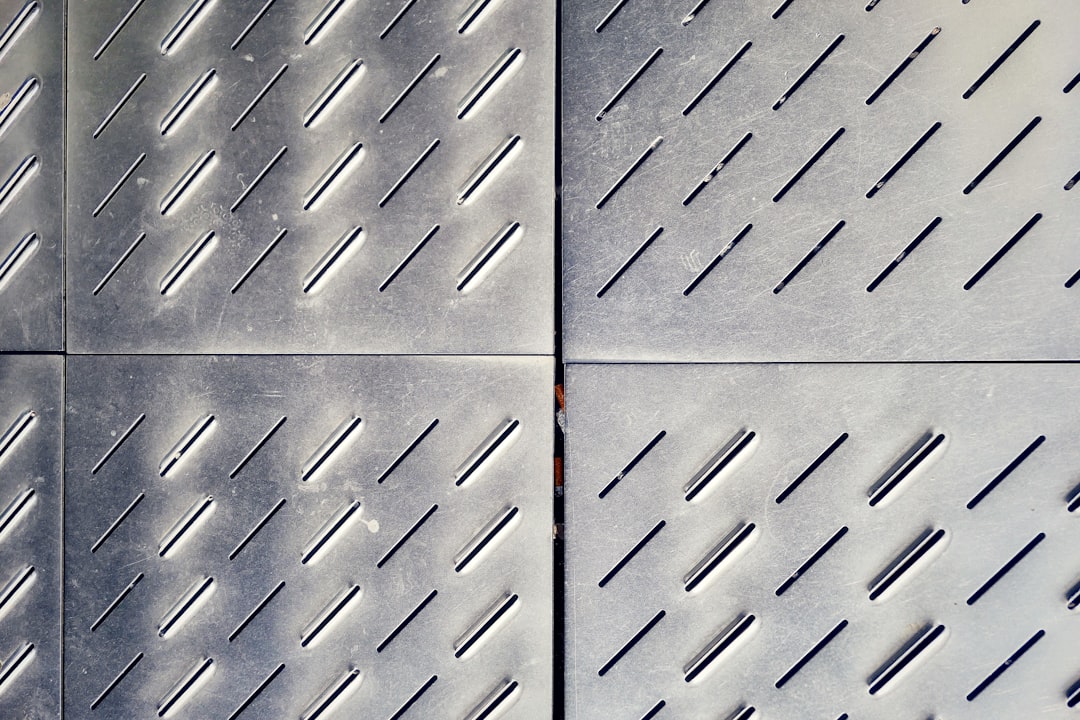 Stacked steel plate, standing in for the carried assets behind Hyundai Wia stock