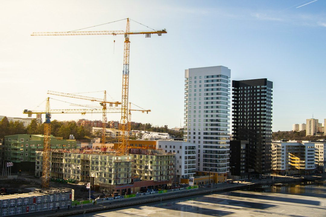 IS Dongseo stock and residential towers under construction with tower cranes