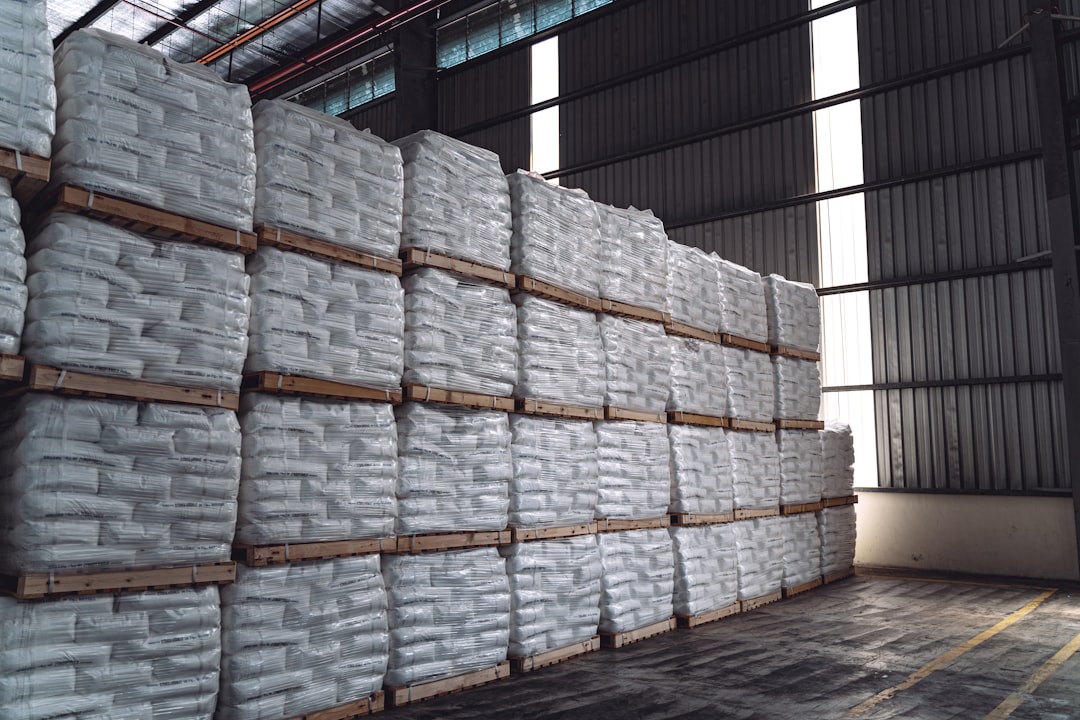KG Chemical stock analysis image of fertilizer sacks stacked in a warehouse