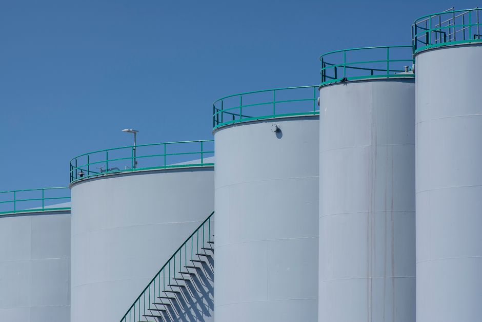 A row of industrial storage tanks, an image for my Korea Petrochemical stock notes