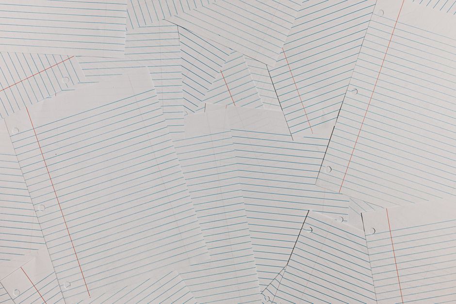 LG Corp stock article abstract image of overlapping sheets of ruled paper