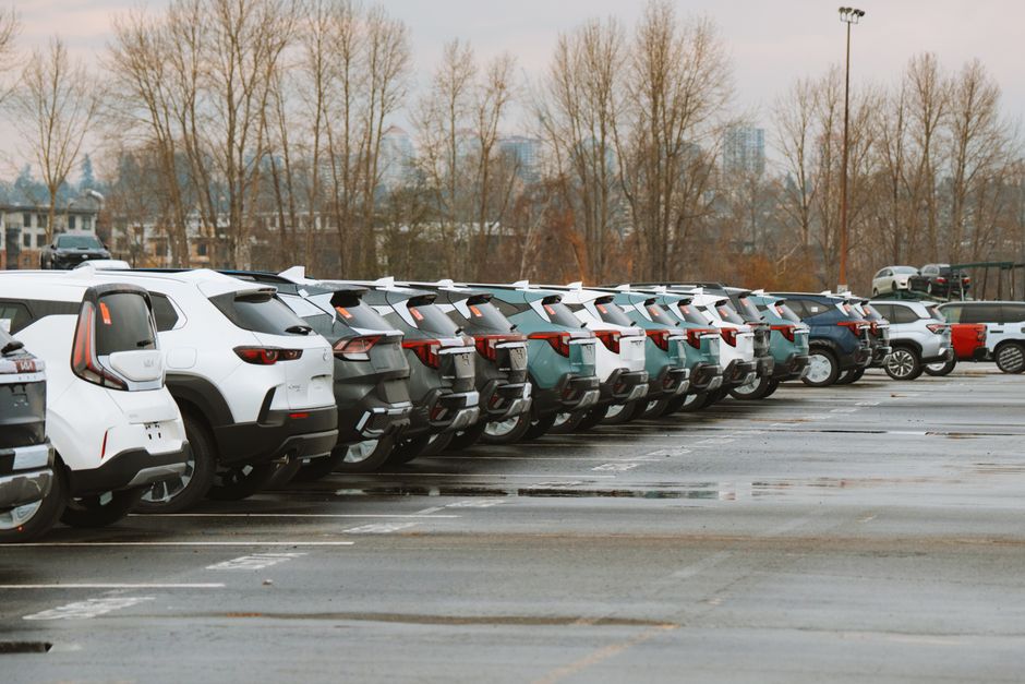 Parked fleet lot illustrating the vehicle base behind Lotte Rental stock