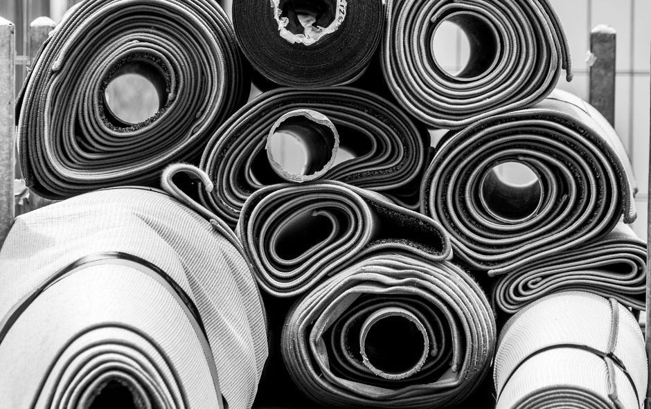 Rolls of sheet material stacked on end, used in my LX Hausys stock journal