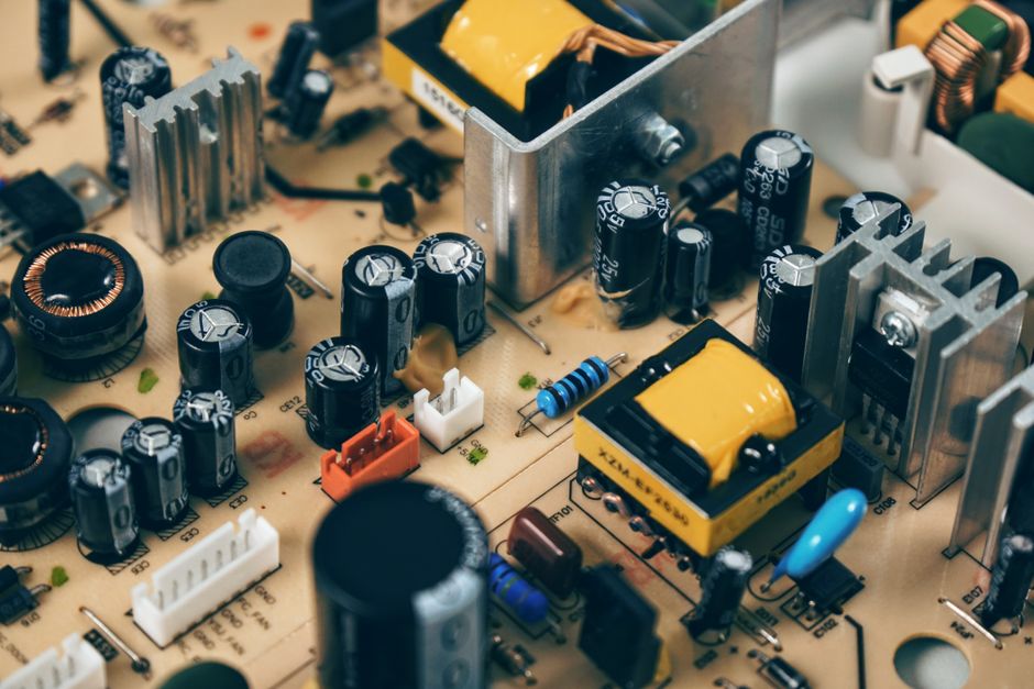 Capacitors and coils mounted on a power supply board