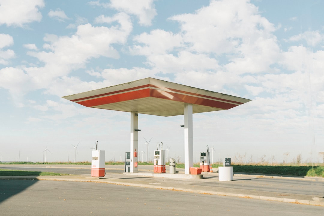A filling station forecourt standing in for the gas station side of the SK REIT stock portfolio