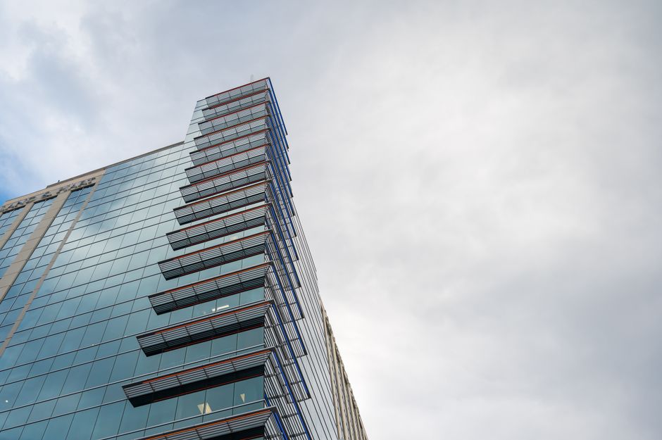 Office tower exterior standing in for the office side of the SK REIT stock portfolio