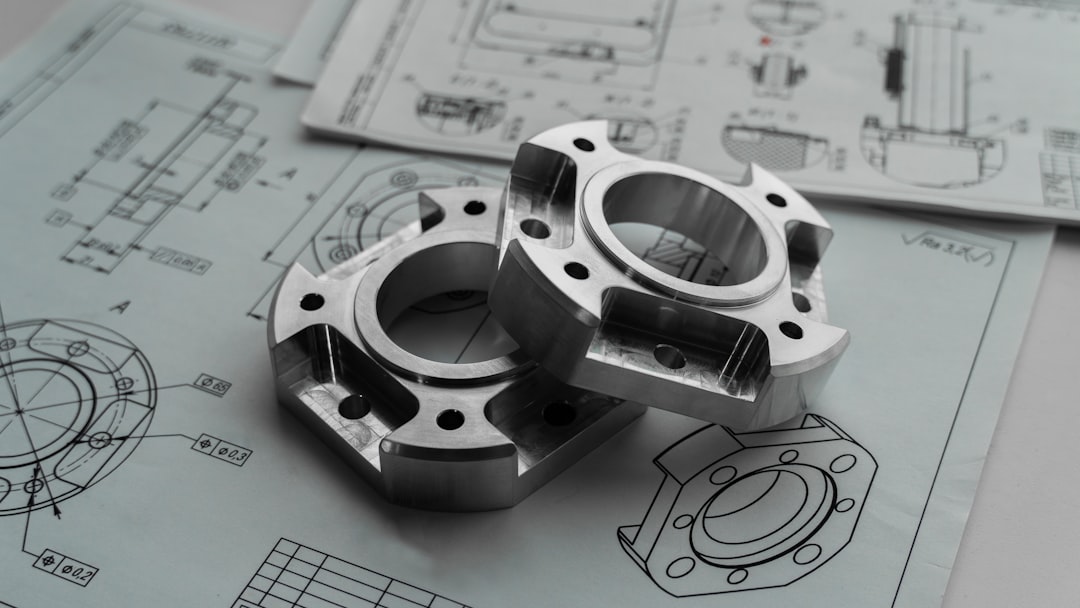 SPG Co stock analysis image of precision-machined components on engineering drawings