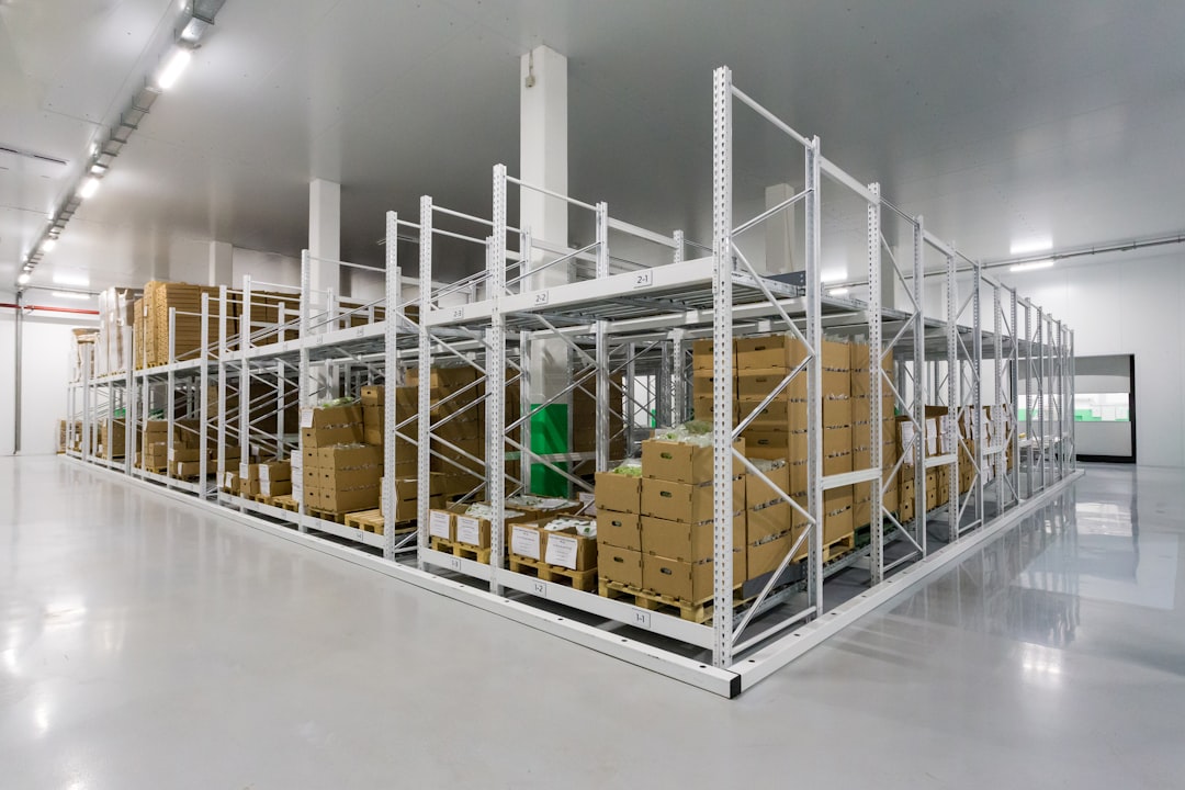 Cardboard cartons stacked on pallet racking in a warehouse